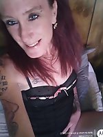A mature woman is opening her mouth wide