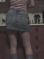 An English speaking woman shows her boobs to the head